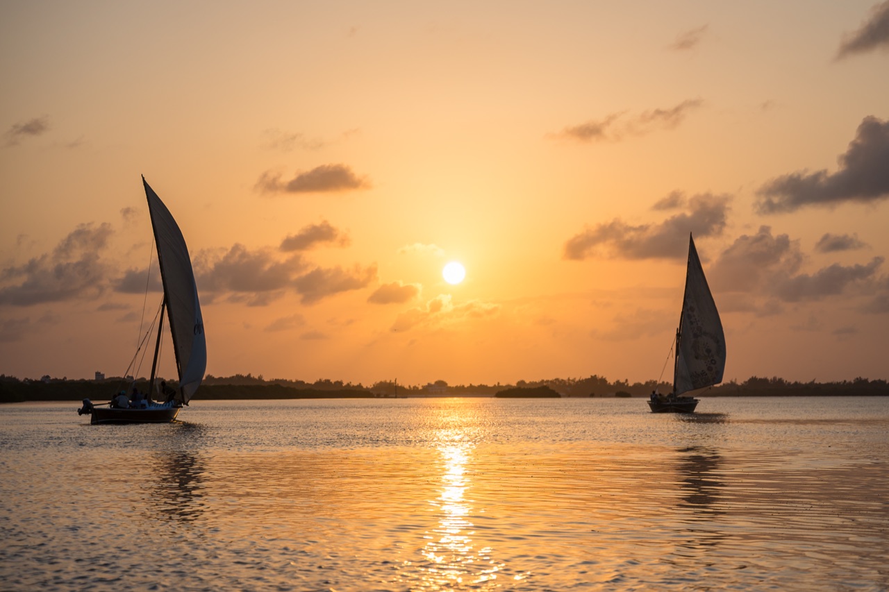A dhow at sunset on the Lamu channel